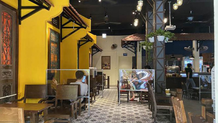 Hanoi cafes seek to follow social distancing measures