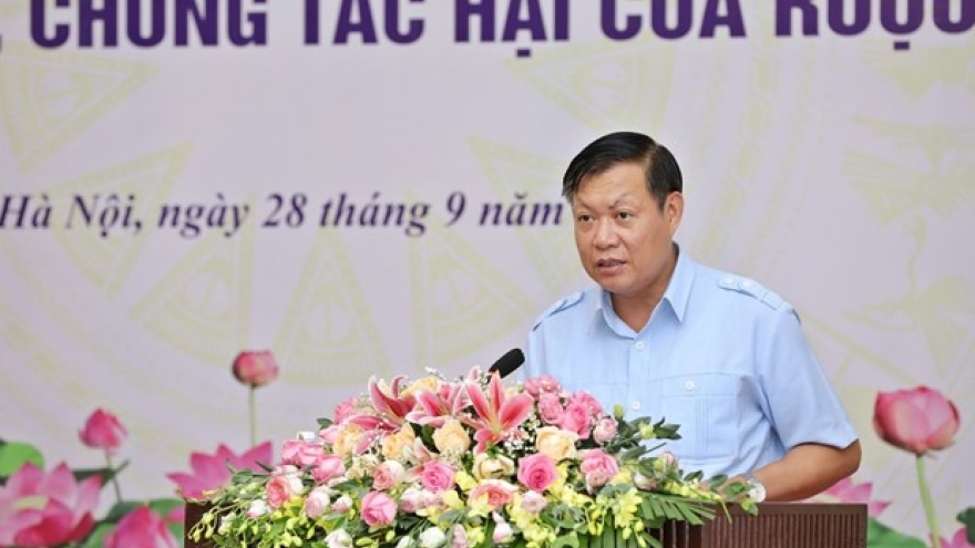 Official urges stronger actions against alcohol harms