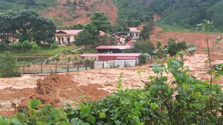 Another landslide leaves dozens buried in mud in central Vietnam 