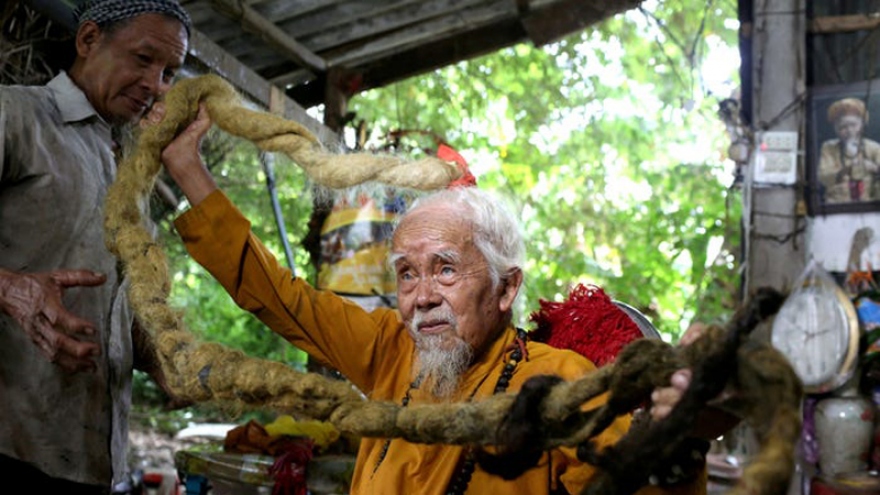 Local elderly man with five-metre long hair among strangest photos of the year