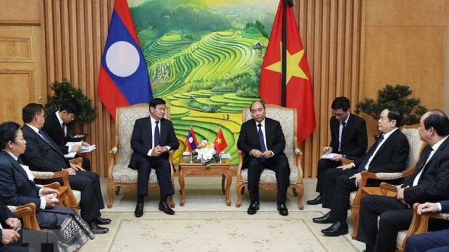 Vietnam, Laos destined to step up all-around cooperation