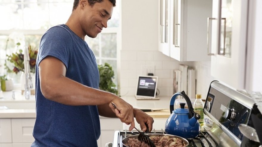 He cooks dinner. What's Cooking good looking. Man is Cooking. Old man Cooking pie at Home.