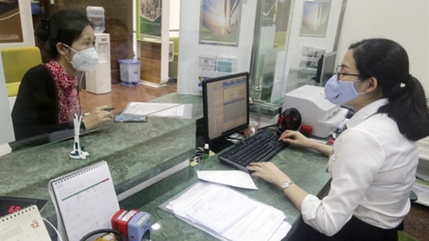 Credit institutions asked to tighten loans in “overheating” sectors: SBV