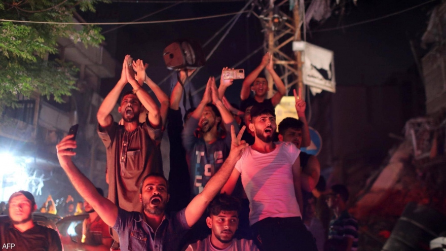 Người dân Palestine ăn mừng sau khi lệnh ngừng bắn có hiệu lực