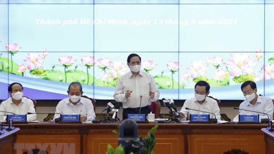 PM holds working session with HCM City officials