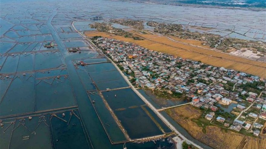 Tranquil village by largest brackish lagoon in Southeast Asia