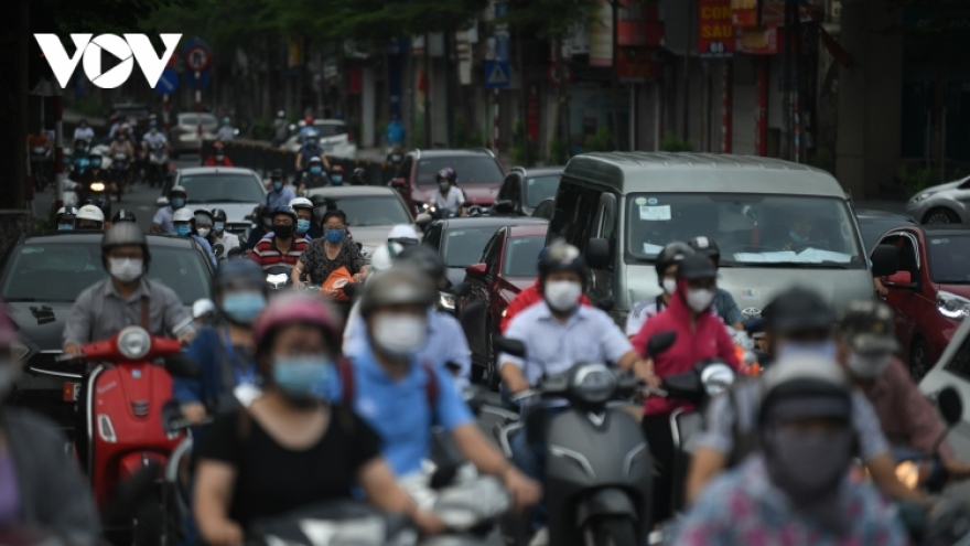 People in Hanoi take to streets after lockdown restrictions eased