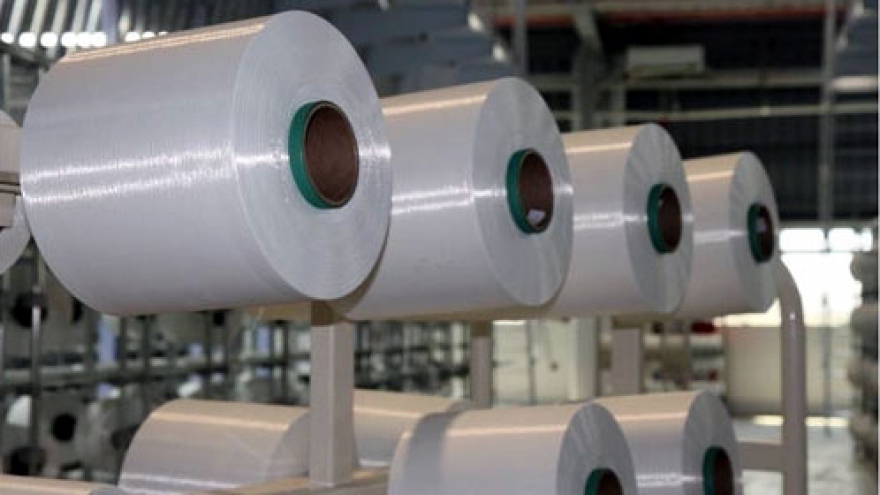 Mỹ xác định biên độ phá giá đối với sợi dún polyester của Việt Nam