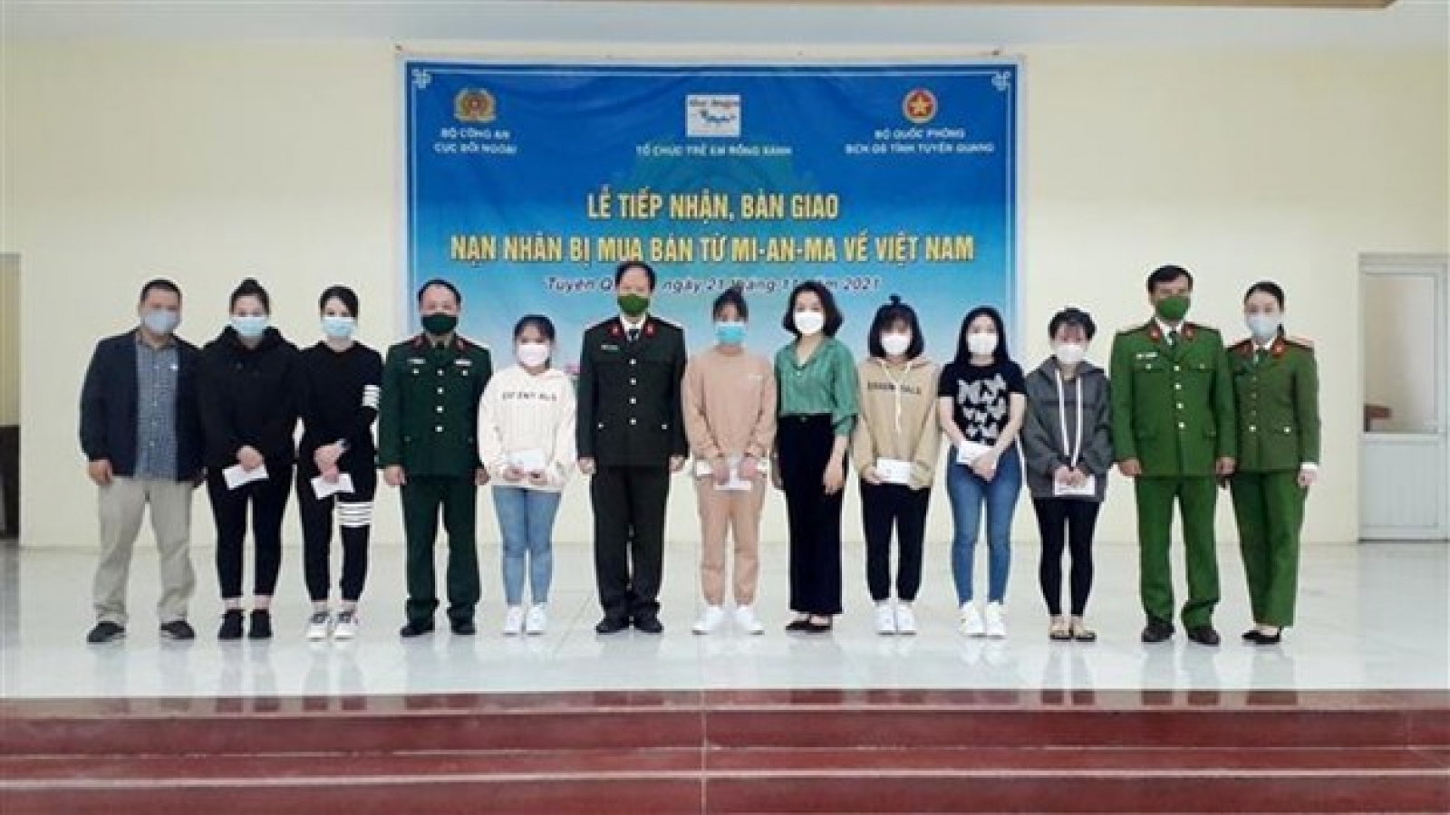 Fourteen people trafficked to Myanmar return home