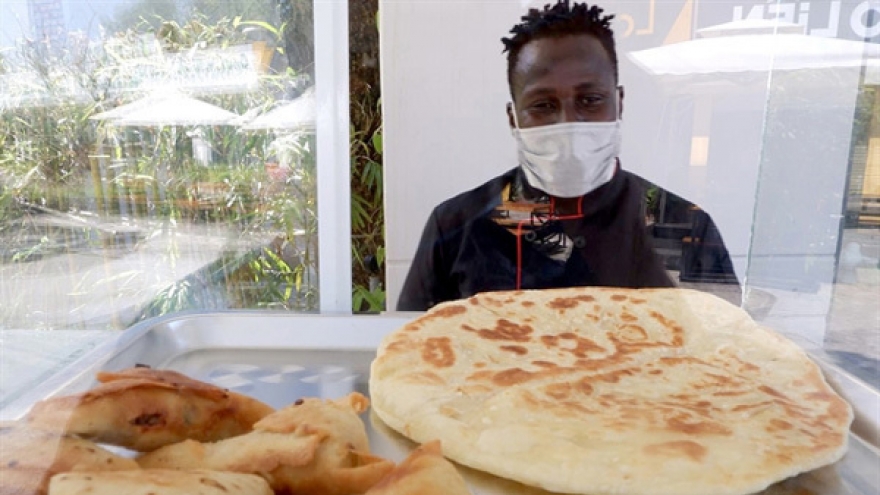 Ugandan dancer brings African cuisine to Vietnam