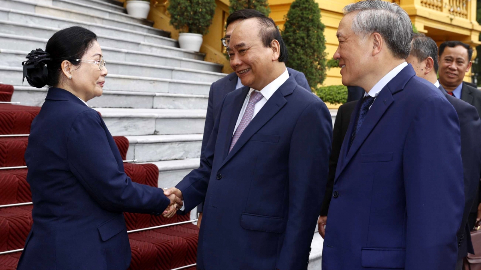 State President welcomes Laos Supreme Court leader in Hanoi