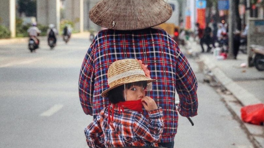 Local women earn a living on streets throughout Hanoi