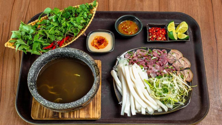 Beef pho served in hot stone bowls – a Hanoi must-try dish
