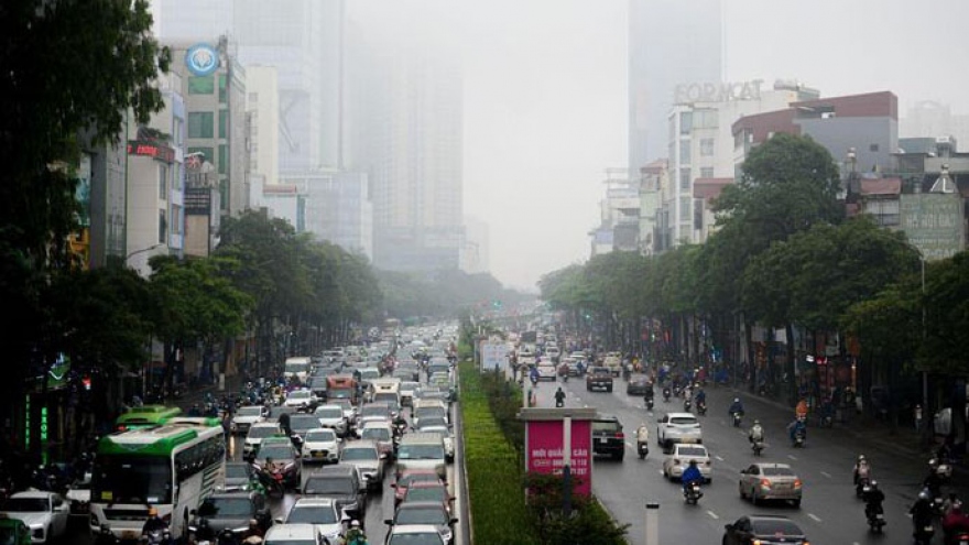 High-rise buildings hidden amid dense fog in Hanoi