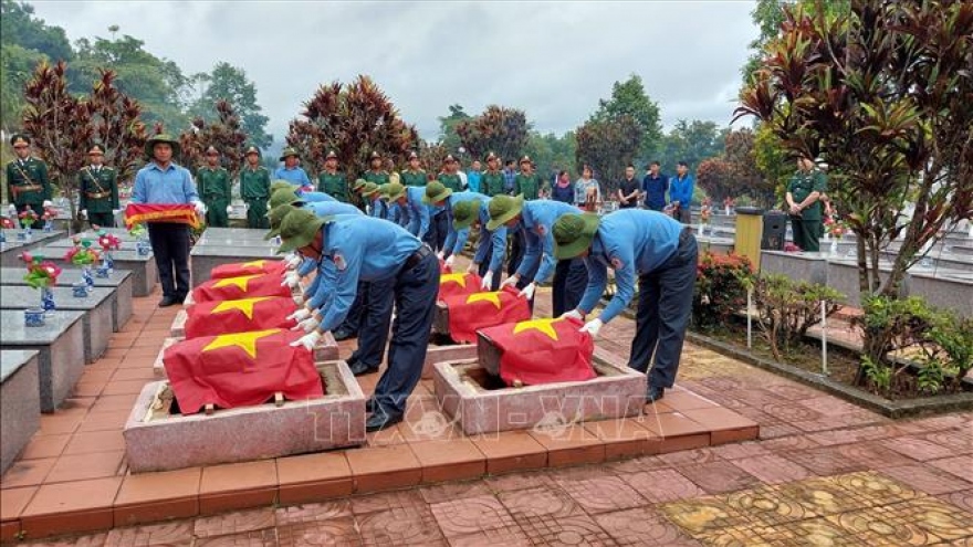 Kon Tum re-inters martyr remains repatriated from Cambodia, Laos