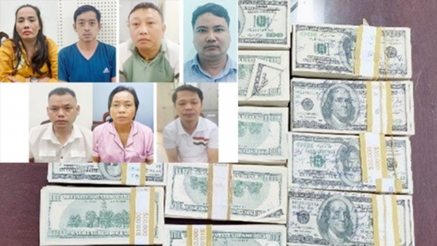 Large-scale counterfeit money ring busted in Hanoi