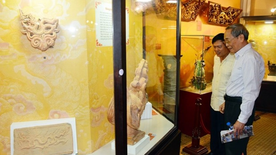 Antiques with dragon images displayed in HCM City