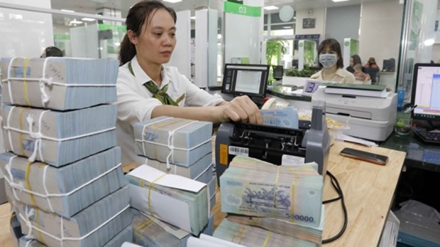 Nearly 20 commercial banks lower deposit rates