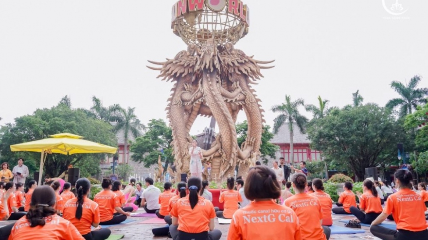 2,000 people perform yoga at summer festival