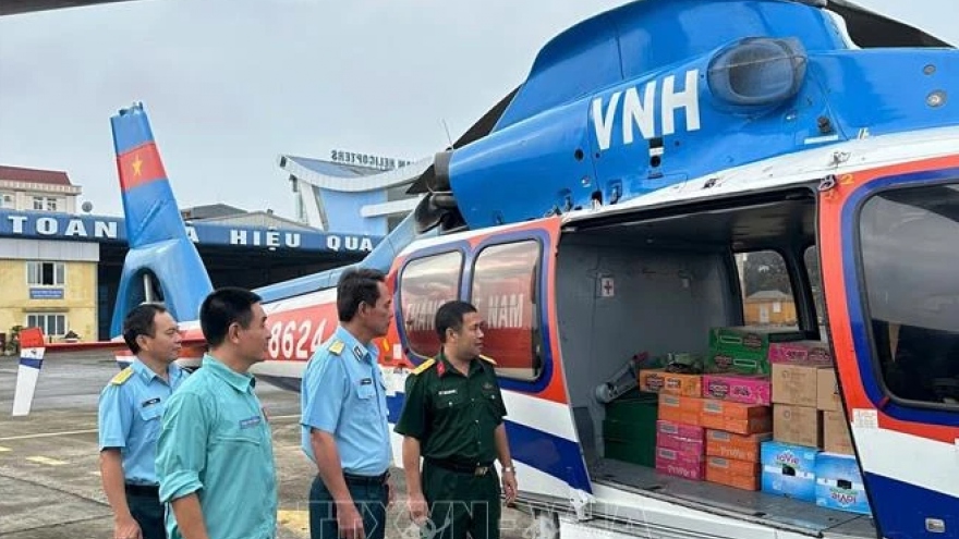 More helicopters take flight to transport relief packages for flood victims