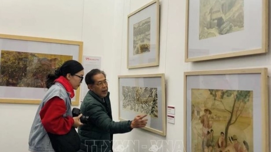 Exhibition celebrates Party’s founding, Lunar New Year