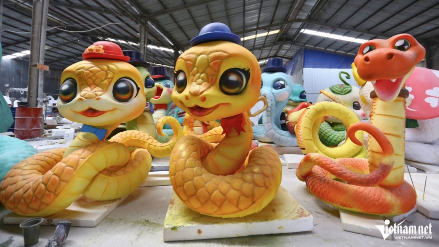 Snake-shaped figurines created for Lunar New Year celebration