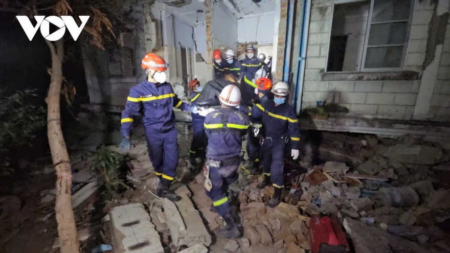 Body of Myanmar boy retrieved from rubble by Vietnamese rescue workers