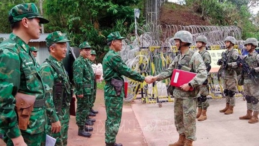 Vietnam, China hold bilateral border patrol