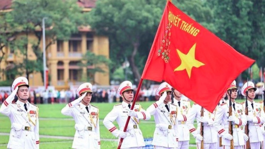 Sacred flag-salute ceremony marks President Ho Chi Minh's 135th birthday