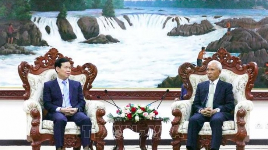 Party commissions of Vietnam, Laos strengthen cooperation in communications