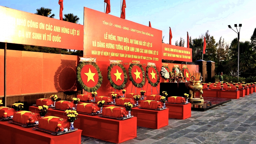 Vietnam reburies remains of 30 fallen soldiers repatriated from Cambodia