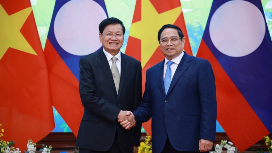 Prime Minister welcomes Lao Party General Secretary and President in Hanoi