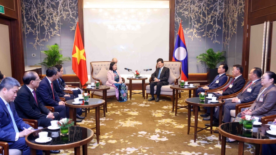 Front leader meets Lao Party General Secretary, President