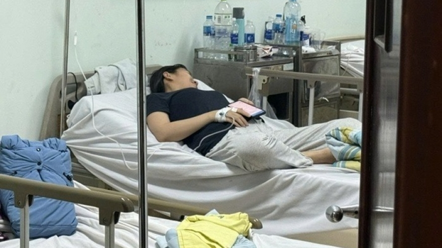 Dozens hospitalised after suspected food poisoning at year-end party