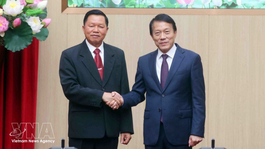 Vietnamese, Lao Public Security Ministries enhance collaboration