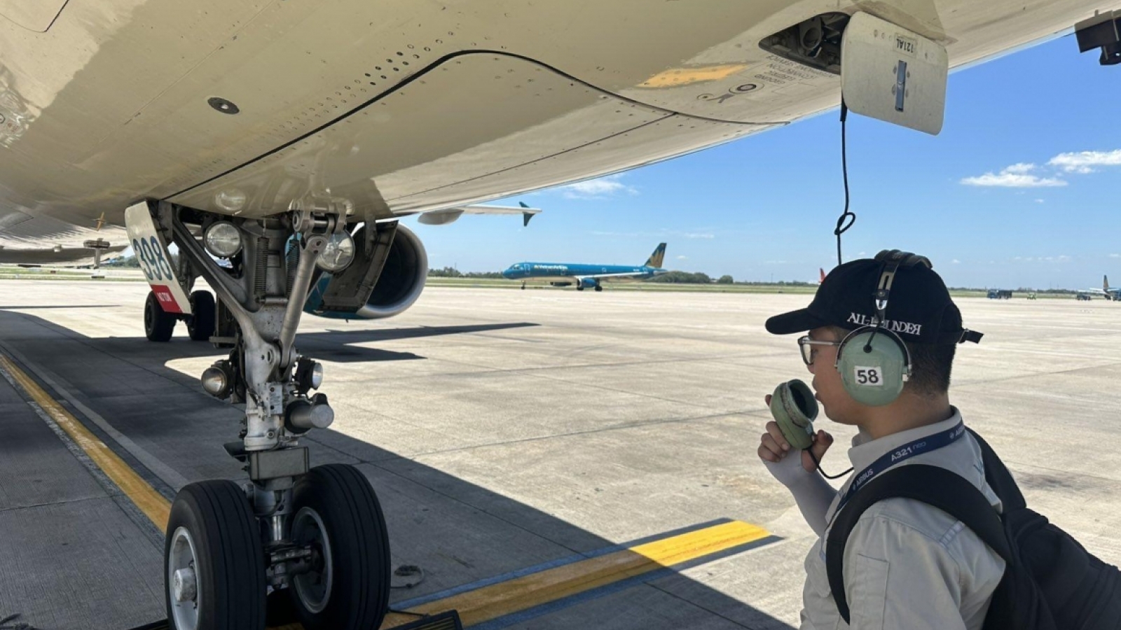 Airport ground staff work in heat up to 80 degrees Celsius