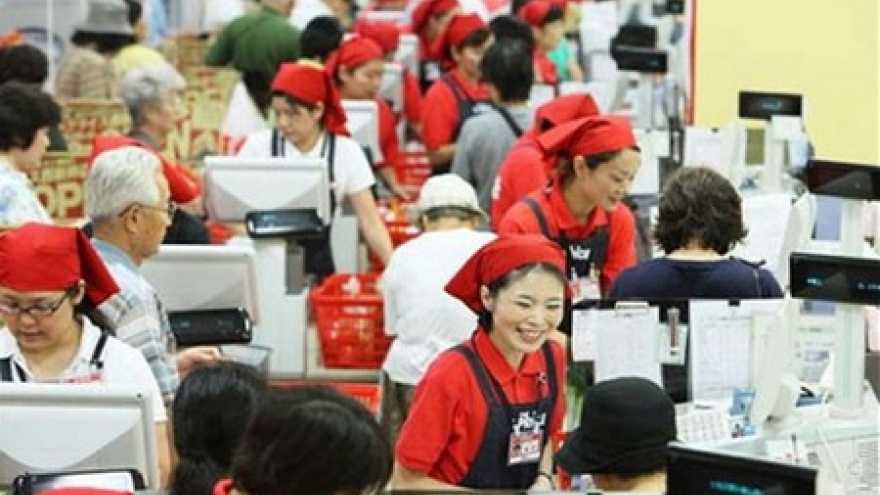Japan postpones sales tax until 2019