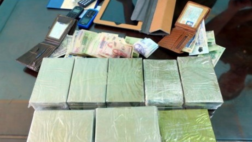 Two drug traffickers, 30 bricks of heroin seized in Son La