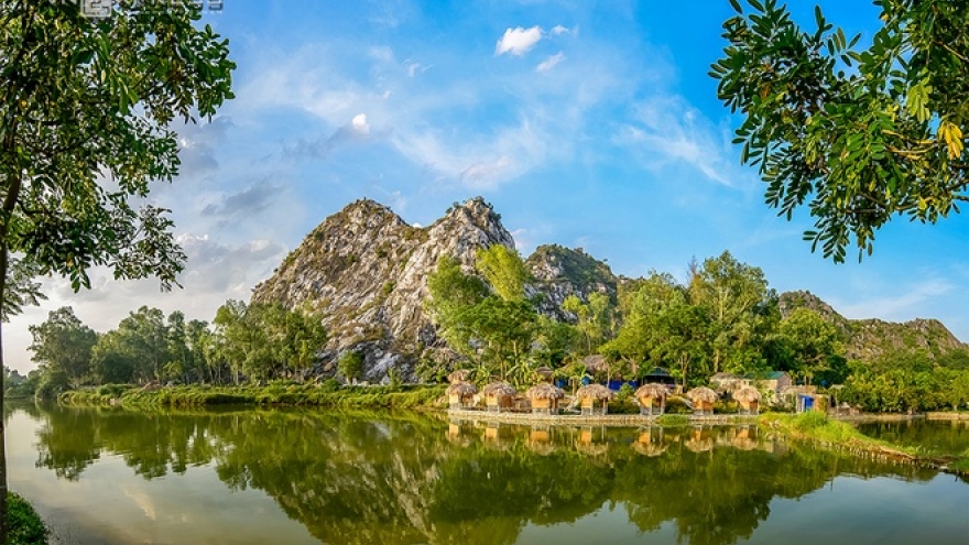 Golden paddy fields at foot of Tram mountain