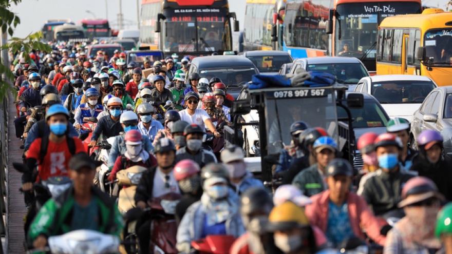 Major cities clogged by traffic as holidays begin