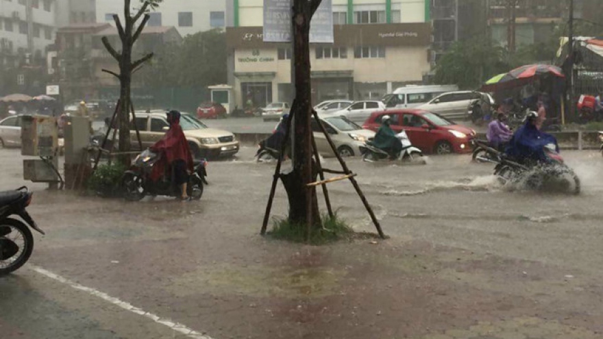 Hanoi streets inundated after heavy rains