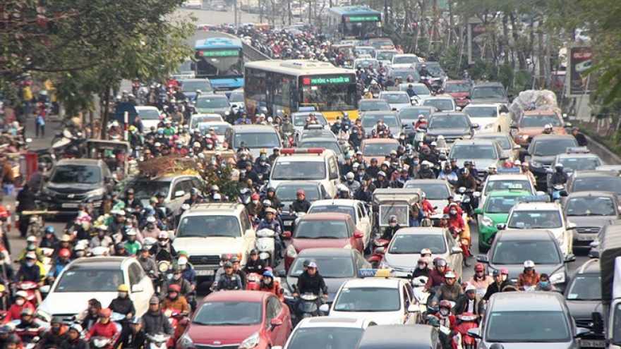 Hanoi, HCM City streets gridlocked as Tet arrives