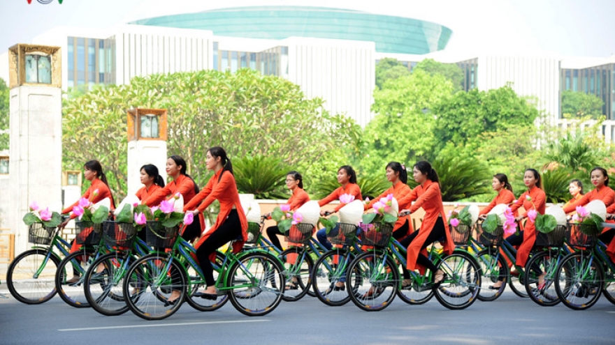 Hundreds descend on Hanoi for mass ride celebrating Ao Dai 