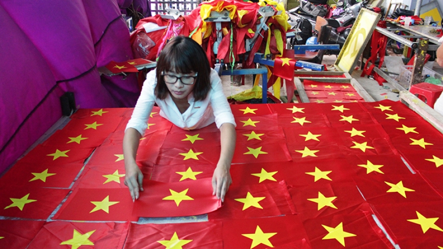 Flag makers sewing up a storm before National Day 