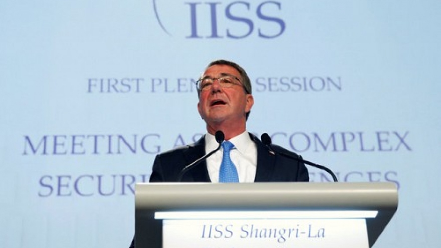 Carter urges China to join 'principled security network' for Asia