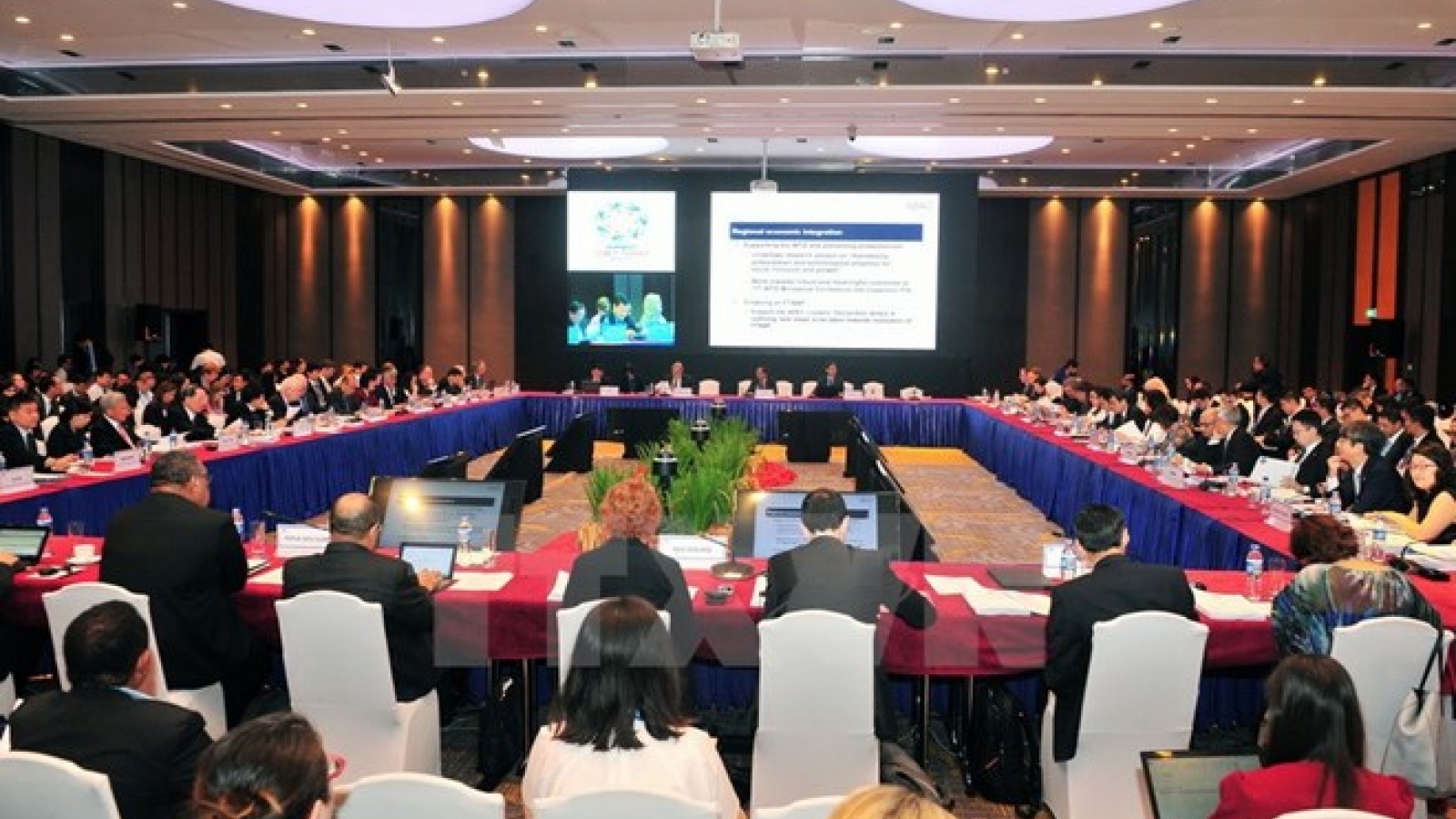 APEC SOM3 deals with pile of work