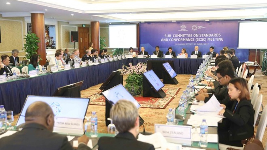 APEC officials continue to debate economic, health issues