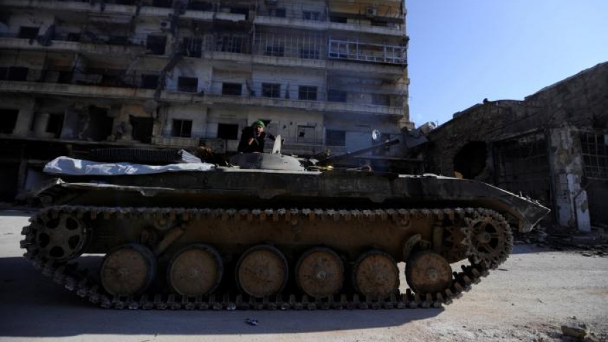 Syrian government forces press attack in east Aleppo