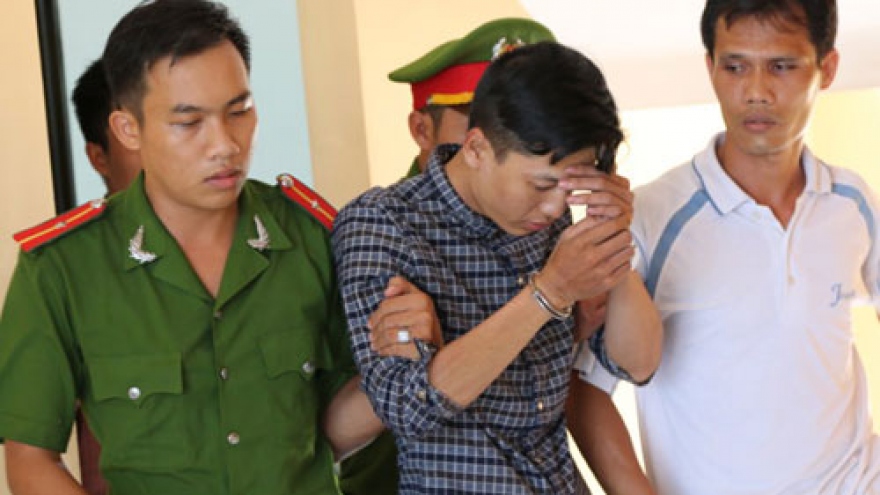 Suspects charged in murder of six people in southern Vietnam