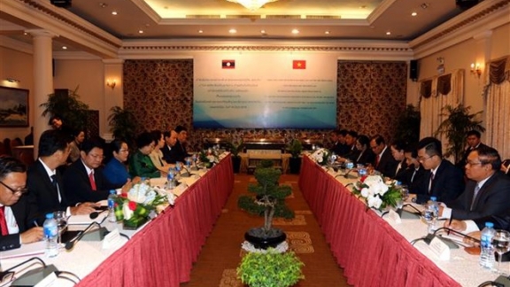 HCM City, Vientiane leaders share Party work experience